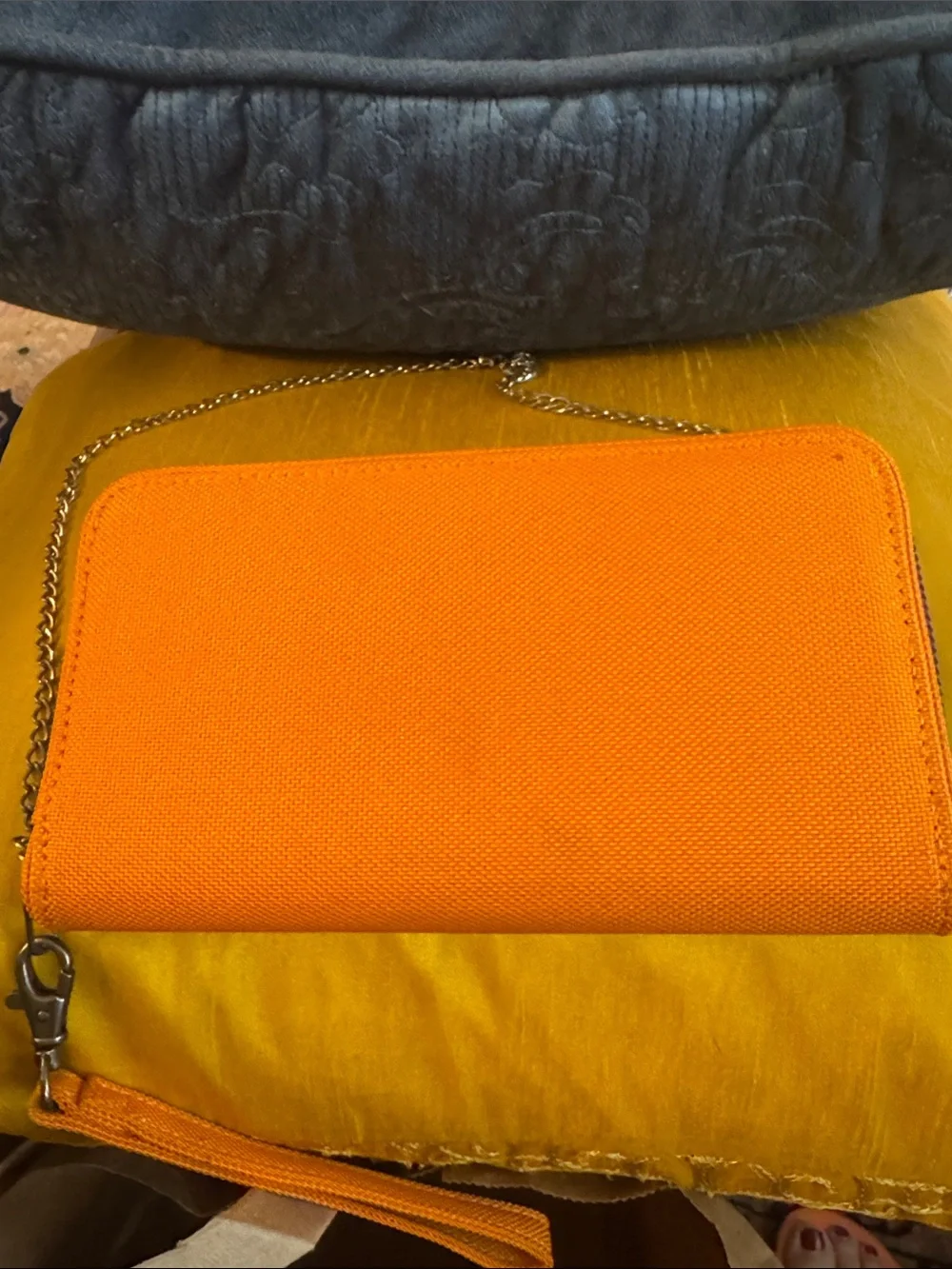 Haiku Orange Floral Embossed Wristlet with Chain Strap